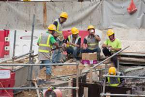 construction workers resting in the heat