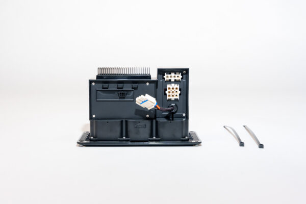 A black APEX™ 1200 digital control panel with exposed connectors, wires, and loose zip ties against a white backdrop.