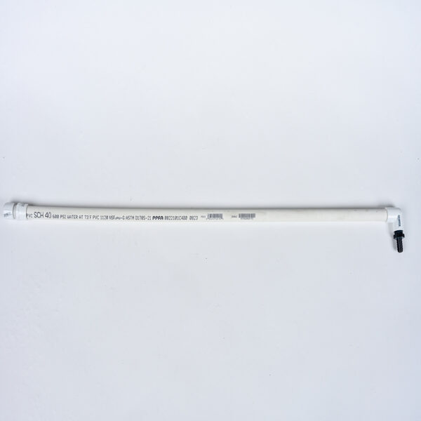 White PVC pipe with black text and small black connector, part of the APEX™ 1200 Spraybar Assembly, on a white background.