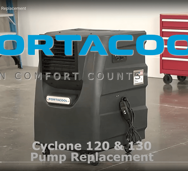 A Cyclone portable evaporative cooler, labeled "Cyclone Pump Replacement," on a concrete floor in front of a red tool cabinet.