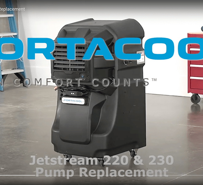 A black Jetstream evaporative cooler on a concrete workshop floor; "Jetstream 220 Pump Replacement" text is visible. Red tool chest partially seen.