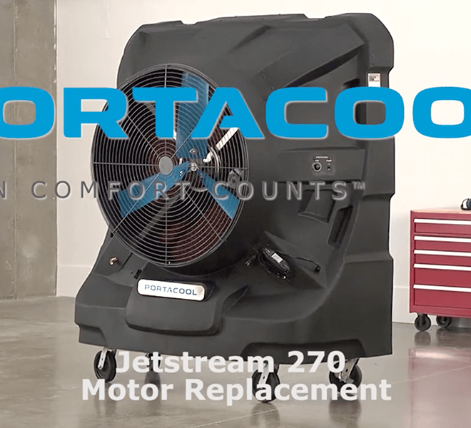 A black Jetstream portable evaporative cooler on wheels is in a workshop with a red tool chest and cement walls. Text reads "Jetstream 270 Motor Replacement.