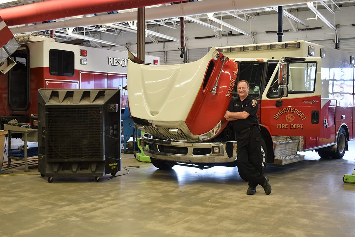 Shreveport Fire Departement Maintenance Facility keeps the garage and shop cool and comfortable even with open bay doors and high ceilings with a portable evaporative air cooling unit.